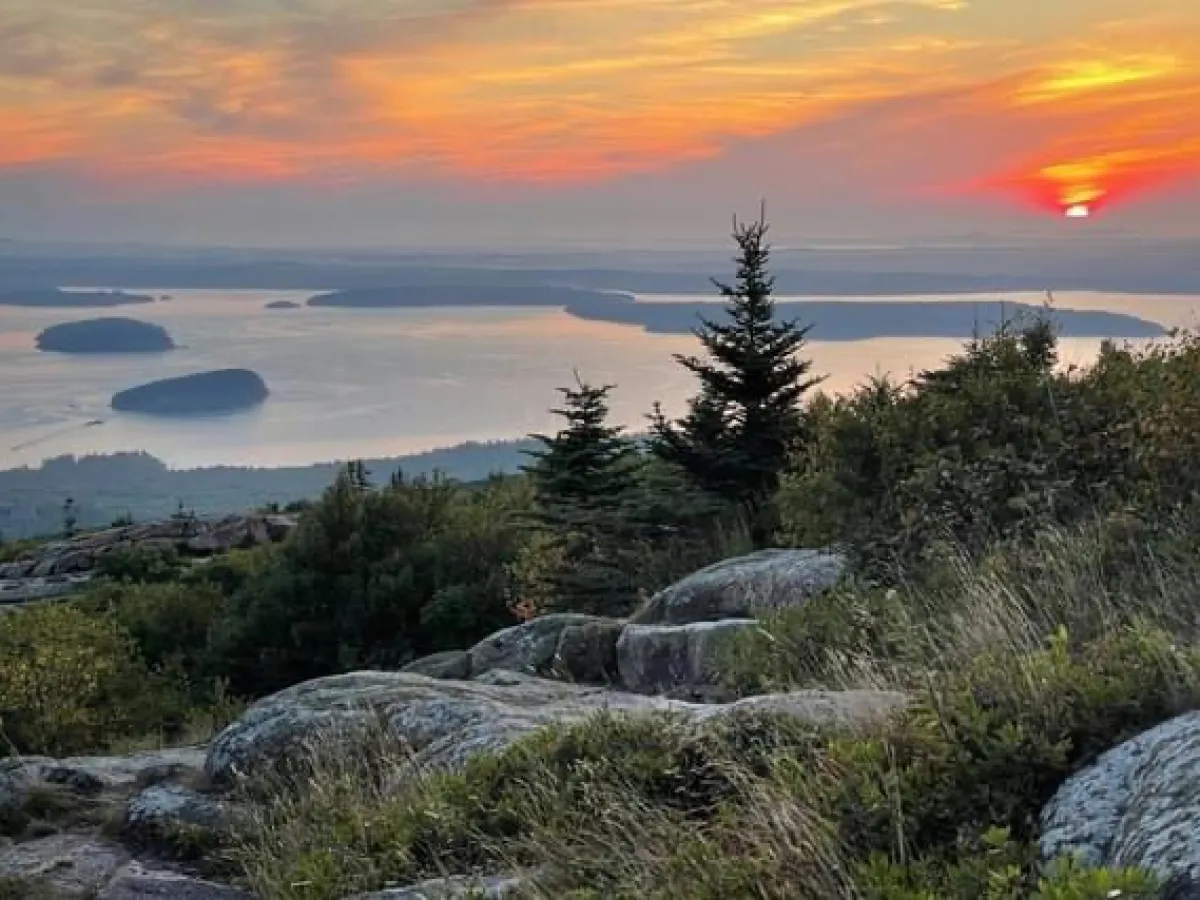 a sunset over a body of water