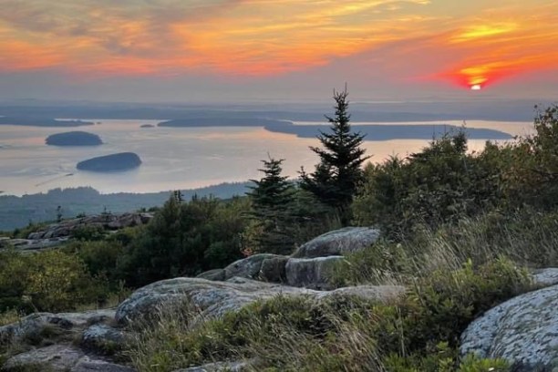 a sunset over a body of water